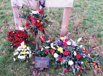 Wreaths  at tree planted by Harry Moses